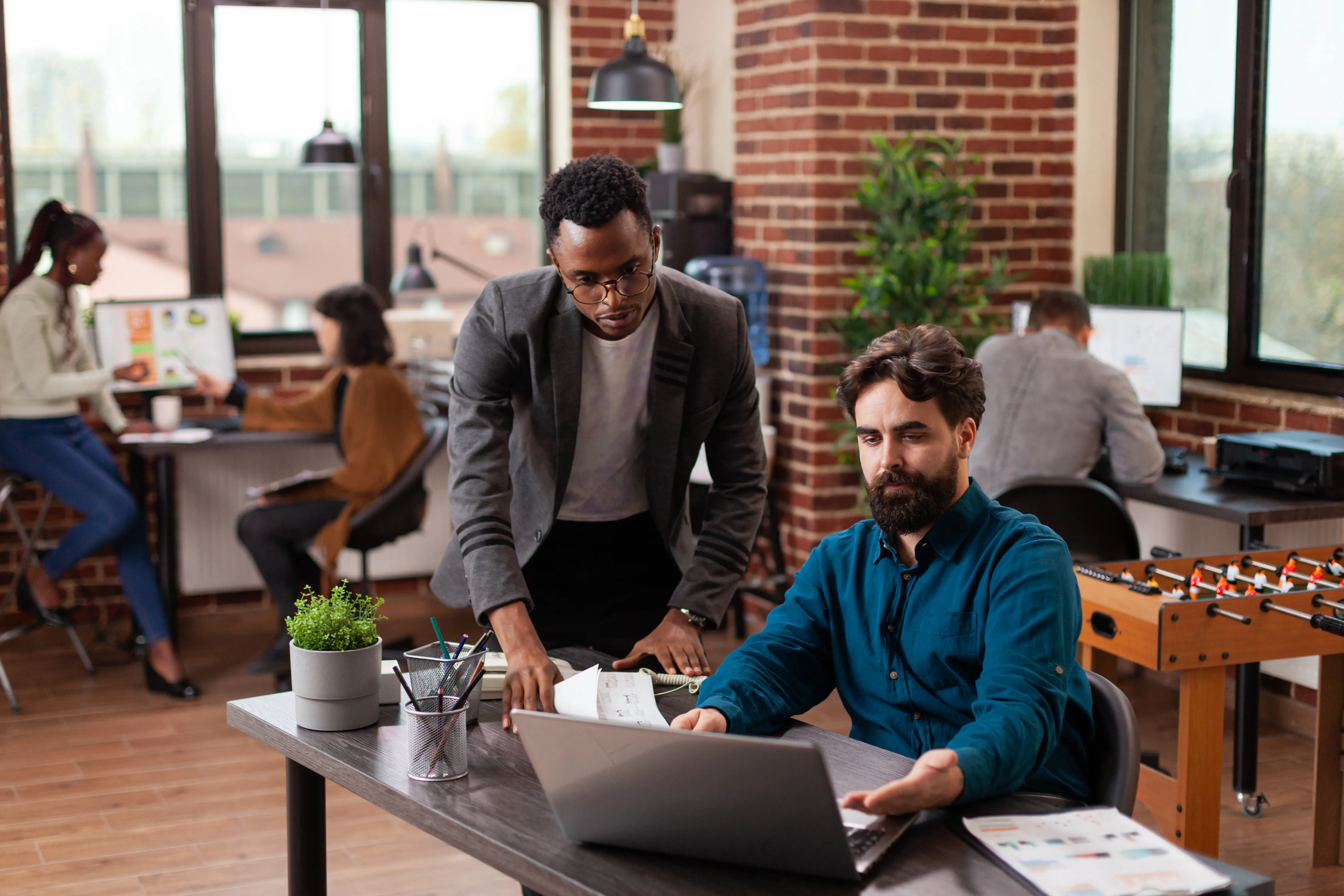 Multi-ethnic businesspeople brainstorming ideas for marketing project